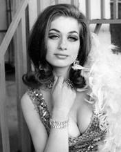 Valerie Leon shows off huge cleavage with feather boa over shoulder 8x10 photo