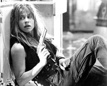 Linda Hamilton in combat outfit holding gun on floor Terminator 2 8x10 photo