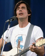 Jackson Browne 1980's in concert singning playing guitar 8x10 inch photo