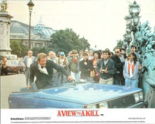 A View To A Kill 1985 original 8x10 lobby card Roger Moore in half a Renault