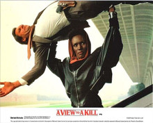 A View To A Kill 1985 original 8x10 lobby card Grace Jones lifts up man