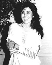 Maria Conchita Alonso smiling for the press at 1980's event 8x10 inch photo