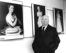 Alfred Hitchcock 1970's portrait in front of museum artwork 8x10 inch photo