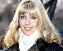 Olivia Newton John with beautiful smile in jacket and scarf 8x10 inch photo