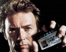 Clint Eastwood shows his Harry Callaghan police badge The Enforcer 8x10 photo