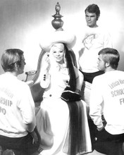 Myra Breckinridge Mae West surrounded by young men 8x10 inch photo