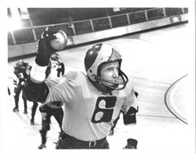 James Caan holding the ball on the circuit 1975 Rollerball 8x10 inch photo