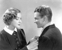 James Cagney in pin striped suit unidentified actress adjusts pocket square 8x10