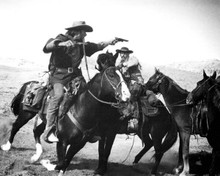 The outlaw Josey Wales 1976 Clint eastwood opens fire on horseback 8x10 photo