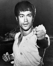 Bruce Lee packs a powerful punch in 1972 Fists of Fury 8x10 inch photo