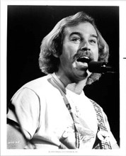 Jimmy Buffett sings into microphone scene from 1978 movie FM 8x10 inch photo