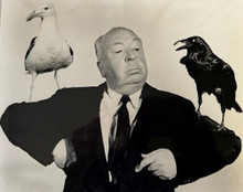 The Birds 1963 director Alfred Hitchcock poses with two birds 8x10 inch photo