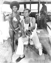 Live and Let Die Roger Moore sits in fishing chair Gloria Hendry 8x10 photo