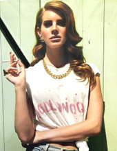 Lana del Ray cool pose in white t-shirt holding cigarette 8x10 inch photo