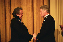 Johnny Cash shakes hands with President Bill Clinton 8x10 inch photo