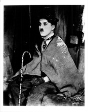Charlie Chaplin as the Little tramp with sack around him 8x10 inch photo