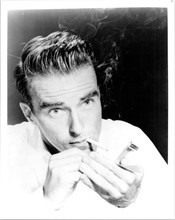 Montgomery Clift mights up cigarette 1950's pose 8x10 inch photo