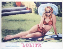 Lolita Sue Lyon sunbathes in bikini and sunglasses 11x14 inch movie poster