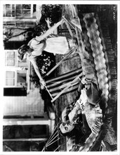 The Thin Man William Powell knaps on hammock in garden Myrna Loy