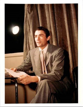 Gregory Peck 1940's era in suit sitting in his dressing room 8x10 inch photo