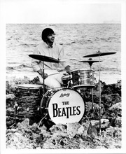 Help The Beatles movie Ringo Starr plays drums on rocks by beach 8x10 inch photo