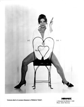 Victoria Abril smokes cigar on chair leggy pose French Twist 1995 8x10 photo