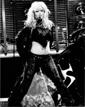 Britney Spears in two piece black outfit performs on stage 8x10 inch press photo