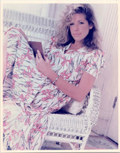 Carly Simon 1980's pose seated in wicker chair holding book 8x10 inch photo