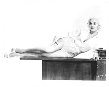 Mamie Van Doren 1950's pin-up in shorts lying on desk 8x10 inch photo
