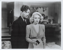 Robert Taylor in 1930's movie with unidentified actress 8x10 inch photo