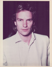 Sting in white shirt & jacket 1970's/early 80's Police greets cameras 8x10 photo