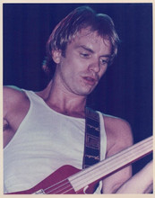 Sting plays guitar in white sleeveless shirt early 1980's Police era 8x10 photo