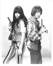 Sonny and Cher both holding guns 1968 portrait 8x10 inch photo for TV show