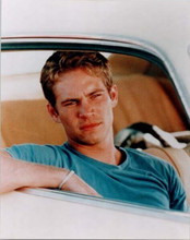 Paul Walker in t-shirt looks through window of car Fast & Furious 8x10 photo