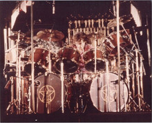 Rush drummer Neil Peart on stage in 1970's concert vintage 8x10 press photo