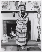 Harriet Nelson stands in front of her fireplace in kimono original 8x10 photo