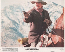 The Shootist 1976 original 8x10 lobby card John Wayne on horseback aims gun