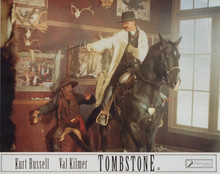 Tombstone 8x10 inch photo Kurt Russell on horseback in saloon