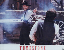 Tombstone 8x10 inch photo Val Kilmer as Doc Holliday fires his gun