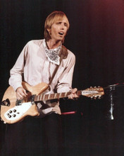 Tom Petty playing his guitar on stage 1980's era in concert 8x10 inch photo