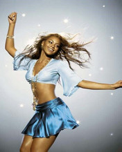Beyonce strikes a pose in blue skirt with bare midriff 8x10 inch photo