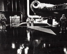Star Wars Stormtroopers gather by Millenium Falcon in hangar 8x10 inch photo
