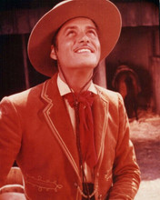 Guy Williams smiles as he looks upwards 1957 TV western 8x10 inch photo