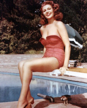 Rita Hayworth in strapless red swimsuit on diving board by pool 8x10 photo