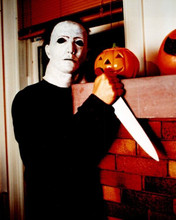 Halloween 1978 Michael Myers The Shape brandishes knife by pumpkins 8x10 photo
