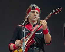 Dire Straits lead vocals & guitarist Mark Knopfler plays guitar 8x10 photo