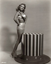 Jayne Mansfield patriotic in stars bikini by large Lincoln top hat 8x10 photo