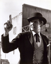 Gene Barry as lawman Bat Masterson holding up his Colt revolver 8x10 inch photo