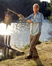 Paul Newman as Cool Hand Luke holding up turtle by river 8x10 inch photo