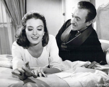 The Pink Panther 1964 David Niven sits on bed with Capucine 8x10 inch photo